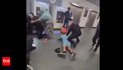 Brutal! Video of man's face kicked, head stamped by cop in Manchester Airport - Times of India