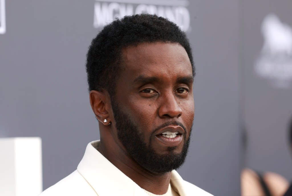 Sean Combs allegedly beat record executive for dating ex Kim Porter: report