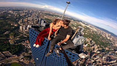 'Rooftopping is my art form': The death-defying couple who climb the world's tallest skyscrapers