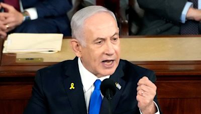 Rashida Tlaib holds up ‘war criminal’ sign during Benjamin Netanyahu’s Congress speech