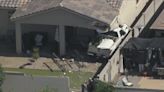 Pickup truck into south Phoenix home