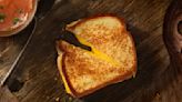 TikTok's Viral Grilled Cheese Sandwich Contains 4 Types Of Cheese, Mayo, And ... Cinnamon?