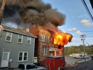 Flames tear through building in Sharpsburg