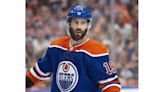 Henrique re-signs with Oilers