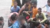 WATCH: Woman On Bike Harassed, Groped By Mob On Flooded Road In Lucknow