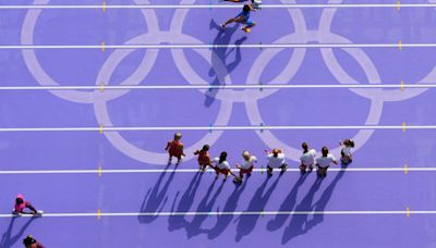 Athletics: Pretty purple track proves popular in Paris