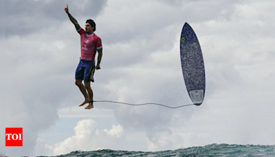 Viral photo: Why this Brazilian Olympic surfer Gabriel Medina's pose has captured the world's attention - Times of India