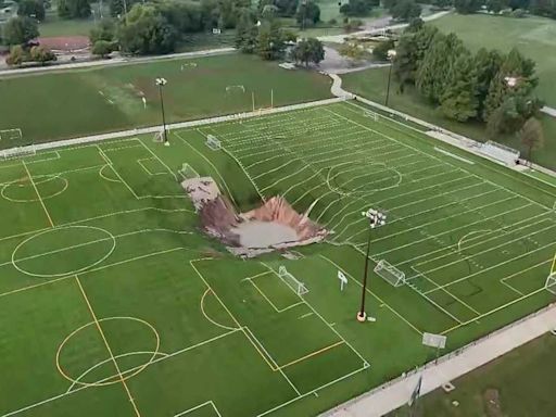 Massive sinkhole continues to grow after swallowing part of soccer field outside St. Louis