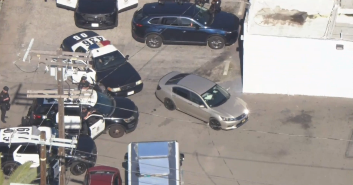 Stolen vehicle suspect barricaded inside car after brief pursuit in San Pedro