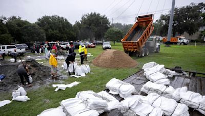 The Latest: Debby knocks out power to hundreds of thousands in Florida, Georgia