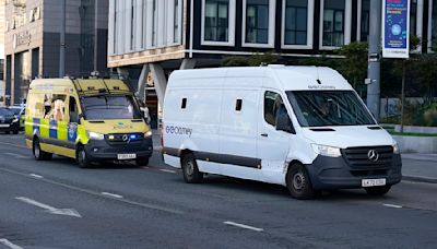 Teenager charged with murdering girls in Southport arrives at court