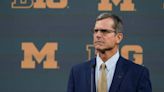 Michigan football coach Jim Harbaugh vows to raise baby if player has unwanted pregnancy