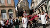 Ox-pulled floats with sacred images of Mary draw thousands to Portugal’s procession