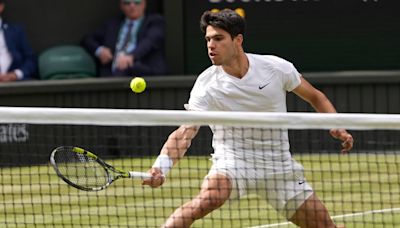 Carlos Alcaraz tops Novak Djokovic in a second consecutive Wimbledon final for a fourth Slam title