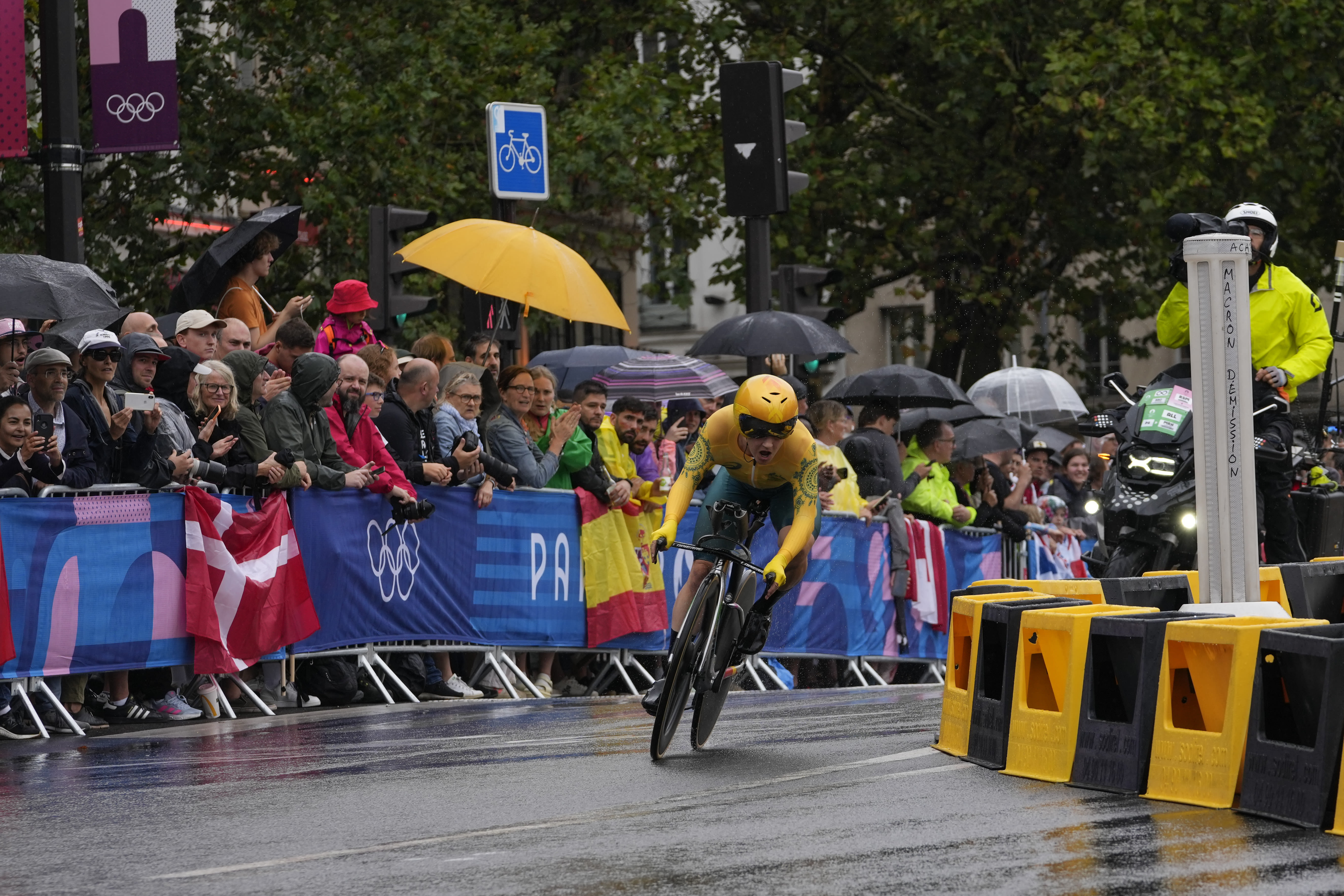 Grace Brown of Australia wins the Olympic time trial over the rainy, treacherous streets of Paris