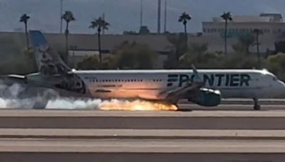 Frontier Airlines jet appears to catch fire while landing at Las Vegas airport, FAA and NTSB investigating