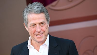 Hugh Grant Recalls Role That Saved His Career & Roles He “Turned Down”