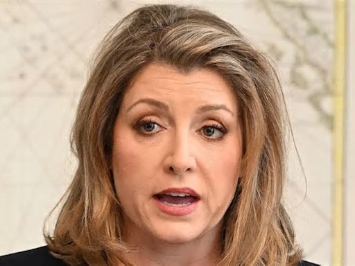 Penny Mordaunt tells Whitehall bosses to ditch woke language like replacing the word 'woman' in official documents