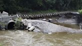 Heavy rain leaves railway tracks dangling after washout in Kitchener