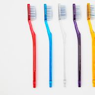 A traditional toothbrush that requires manual brushing action Available in various bristle types, sizes, and shapes Can be made of plastic or biodegradable materials