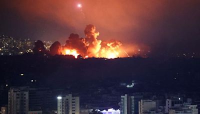 Israeli strike in West Bank 'kills 18' as more huge blasts hit Beirut