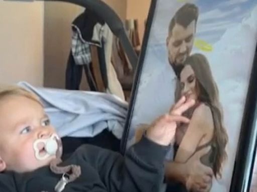 Heartbreaking moment orphaned baby reaches out for his drowned parents