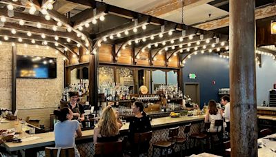 Try this new restaurant in the Warehouse District with a long happy hour, small plates