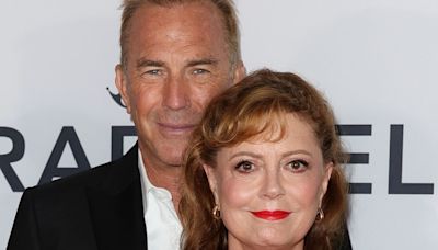 Susan Sarandon, 77, rocks plunging neckline as she hold hands with Kevin Costner, 69