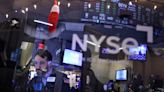 Wall St closes slightly higher after four-day sell off