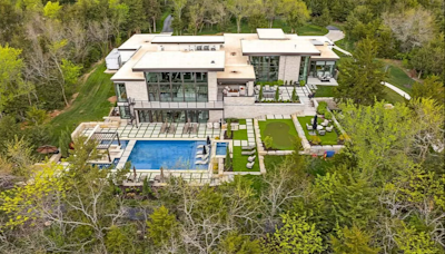 $7.5 million Kansas home comes with a pool, a gym and a view — of the 8-car garage
