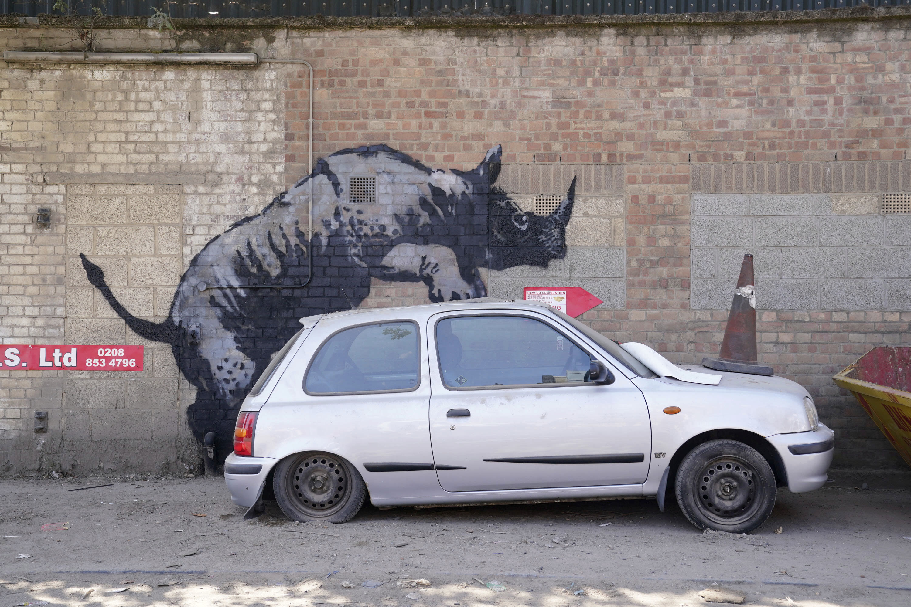 Banksy unveils new rhino art in an animal-themed collection that has popped up across London