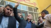 Iranians vote in run-off presidential race amid widespread apathy