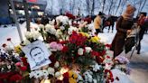 Dozens arrested in Russia as Alexei Navalny laid to rest amid heavy police presence