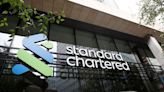 Exclusive-Standard Chartered replaces key emissions gauge for oil and gas loans