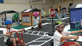 Kids learn how to protect themselves from everyday dangers at Safety Town