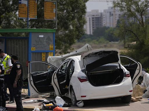 Three people seriously injured after car rams bus stops in Israel