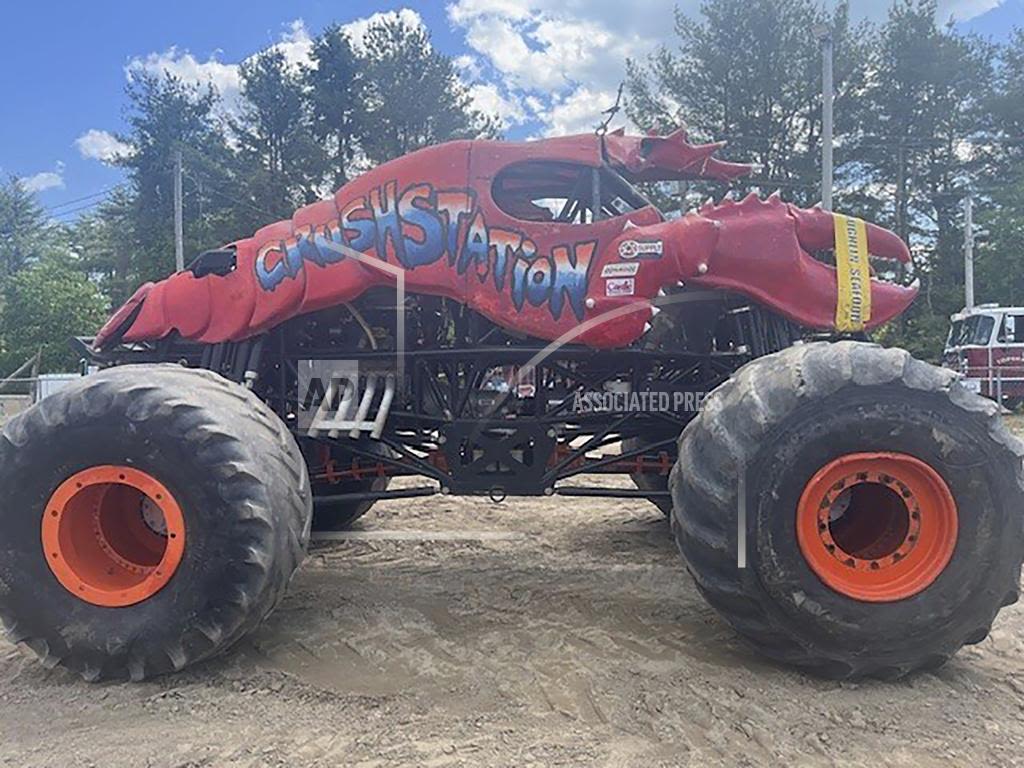 A monster truck clips a power line at a Maine show, toppling utility poles in spectator area - WBBJ TV