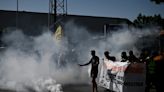 French police clear water demonstrators from port blockade