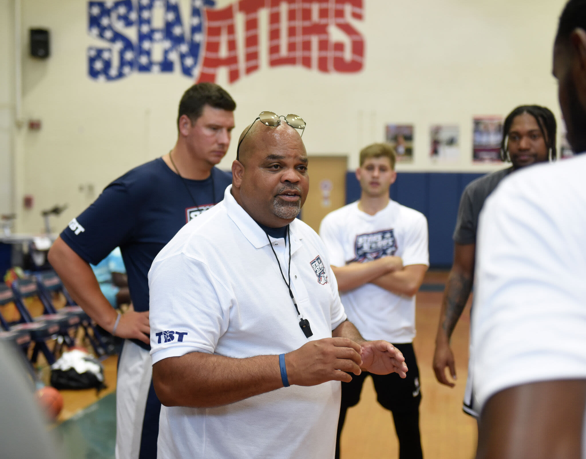 Chris Smith laid the groundwork for UConn men’s basketball. Now he’s coaching the stars who followed.