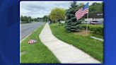 American flags torn down outside car dealership in Greenburgh