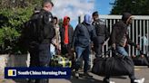 ‘I want to stay’: hundreds of migrants evicted from squat ahead of Paris Olympics