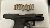 Loaded guns and a grenade found with airport passenger at SEA on Tuesday