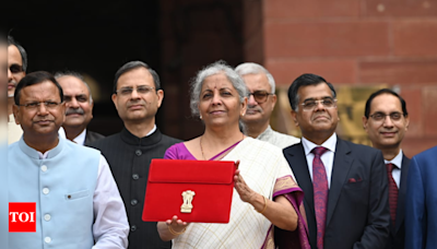 From briefcase, 'bahi khata' to tablet: Changing face of Budget's presentation over the years - Times of India