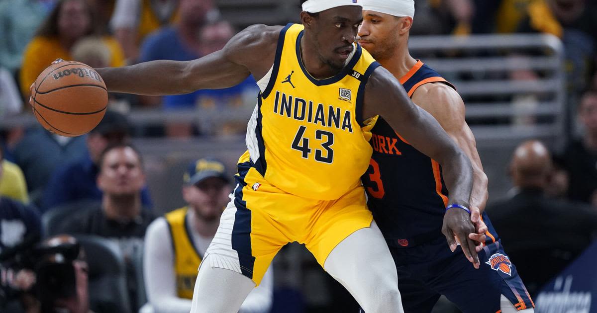 Pascal Siakam of the Indiana Pacers drives the ball around Josh Hart of the New York Knicks in Game 4 of the Eastern Conference Second Round...