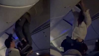 Watch: Air Europa Flight Passenger Gets Stuck On Overhead Bin After Severe Turbulence