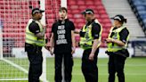 Protestor chains himself to a goalpost ahead of Scotland-Israel women's match