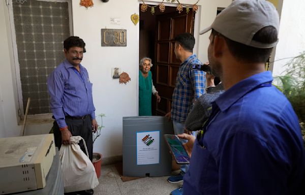 AP PHOTOS: For the first time India's elderly and disabled are able to vote from home