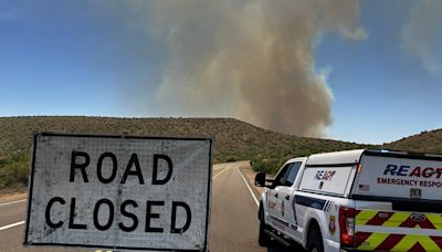 Fast-growing wildfire spreading north of Scottsdale; roads closed