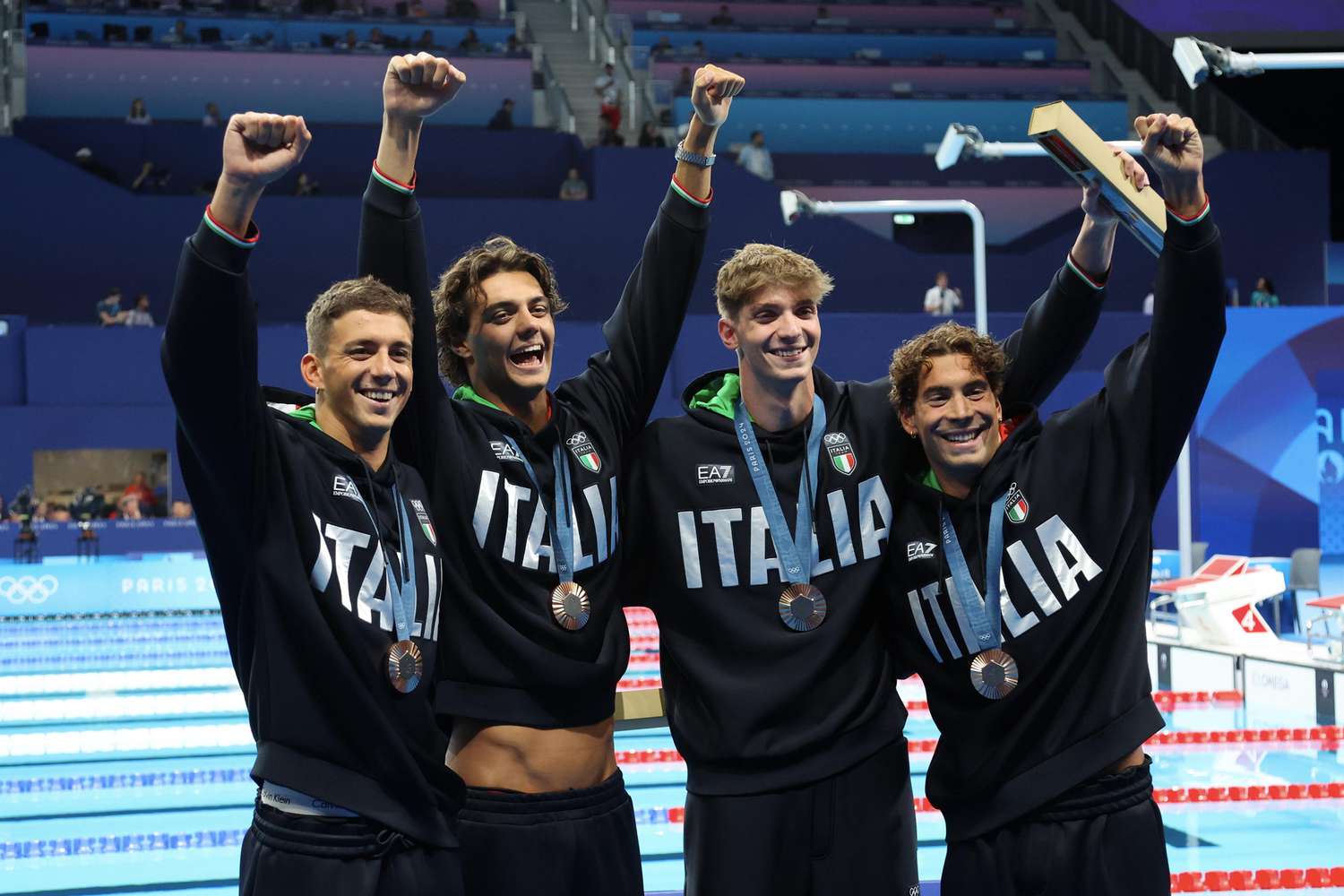Italian Swimmer Bares Abs During Paris Olympics Medal Ceremony and Sets the Internet on Fire