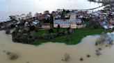 In pictures: Storm Henk wreaks flood chaos across the UK